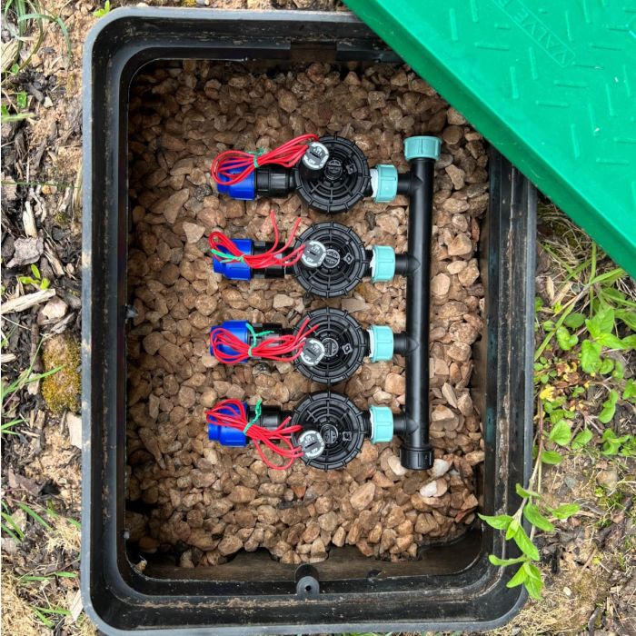 Hunter Irrigation Sprinkler Manifold with PGV Solenoid Valves – 4 Zone. installed inside a valve box. Shop irrigation manifolds and fittings at Water Irrigation.