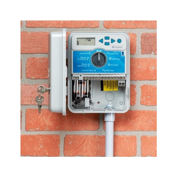 Hunter XC Hybrid 6 Station Outdoor Irrigation Controller. Features a programmable rain delay for the selection of watering days.