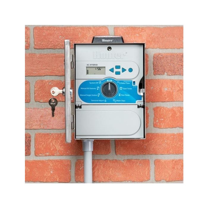 Hunter XC Hybrid 12 Station Outdoor Irrigation Controller. Set the seasonal adjustment to 100% during summertime and reduce it to an appropriate percentage during spring and summer when less irrigation is required.